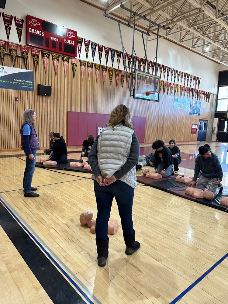 instructors discussing CPR 